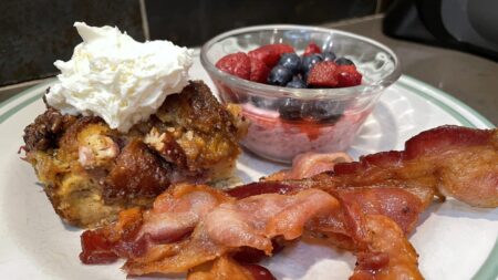 Blueberry Croissant French toast with whipped cream on top