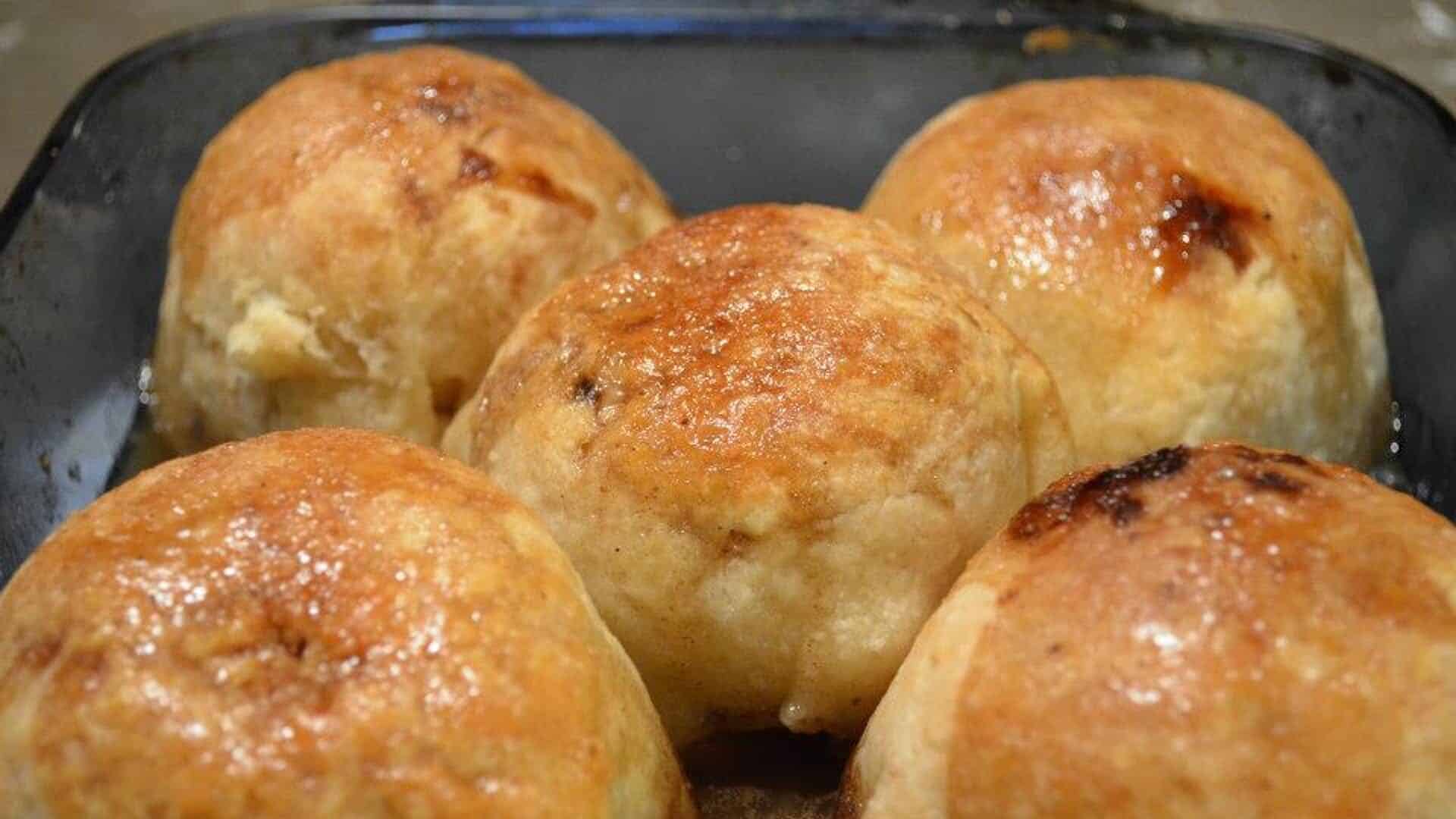 5 apple dumplings in a square glass baking dish
