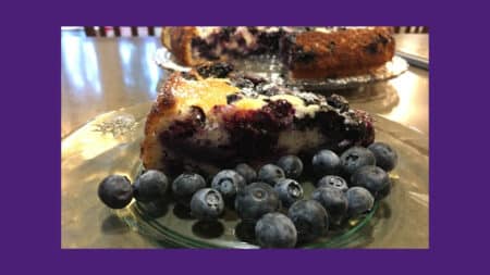 Blueberry Lemon Cake on a glass platter
