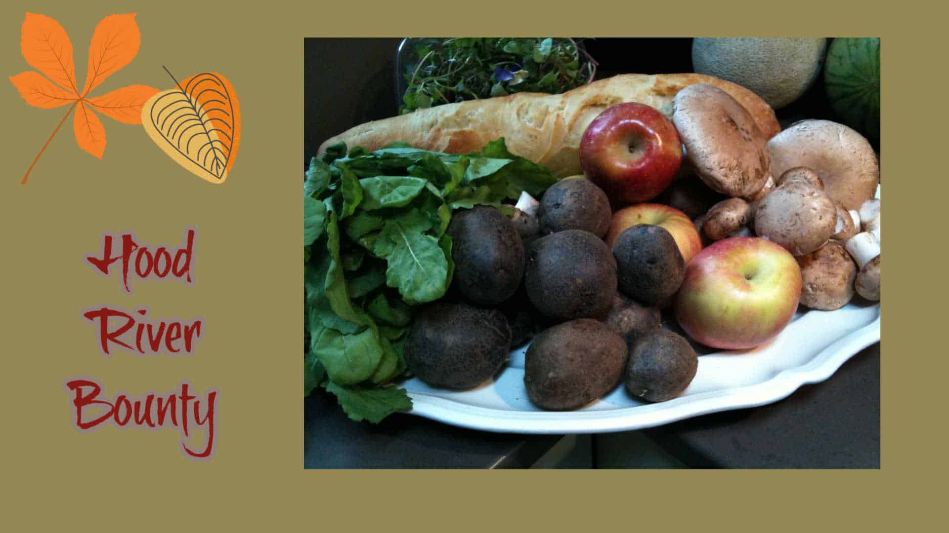 Platter loaded with veggies, fruit and bread
