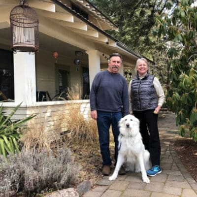 Steve, Mary and Lola Pellegrini in front of the Old Parkdale Inn